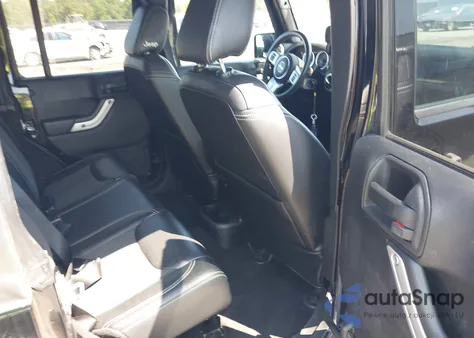 2015 Jeep Wrangler Unlimited Freedom Edition z USA, uszkodzony, nr VIN 1C4BJWDG8FL573414